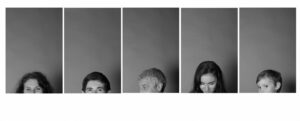 Black and white family photography featuring five vertical panels. Each panel shows just the top part of a person's head. From left to right, there are two adults, a middle-aged man, a young woman, and a young boy, all peeking over a white foreground.