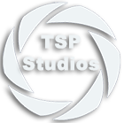 A white logo with the text "TSP Studios" in the center, surrounded by a circular design resembling camera shutter blades, on a light background.